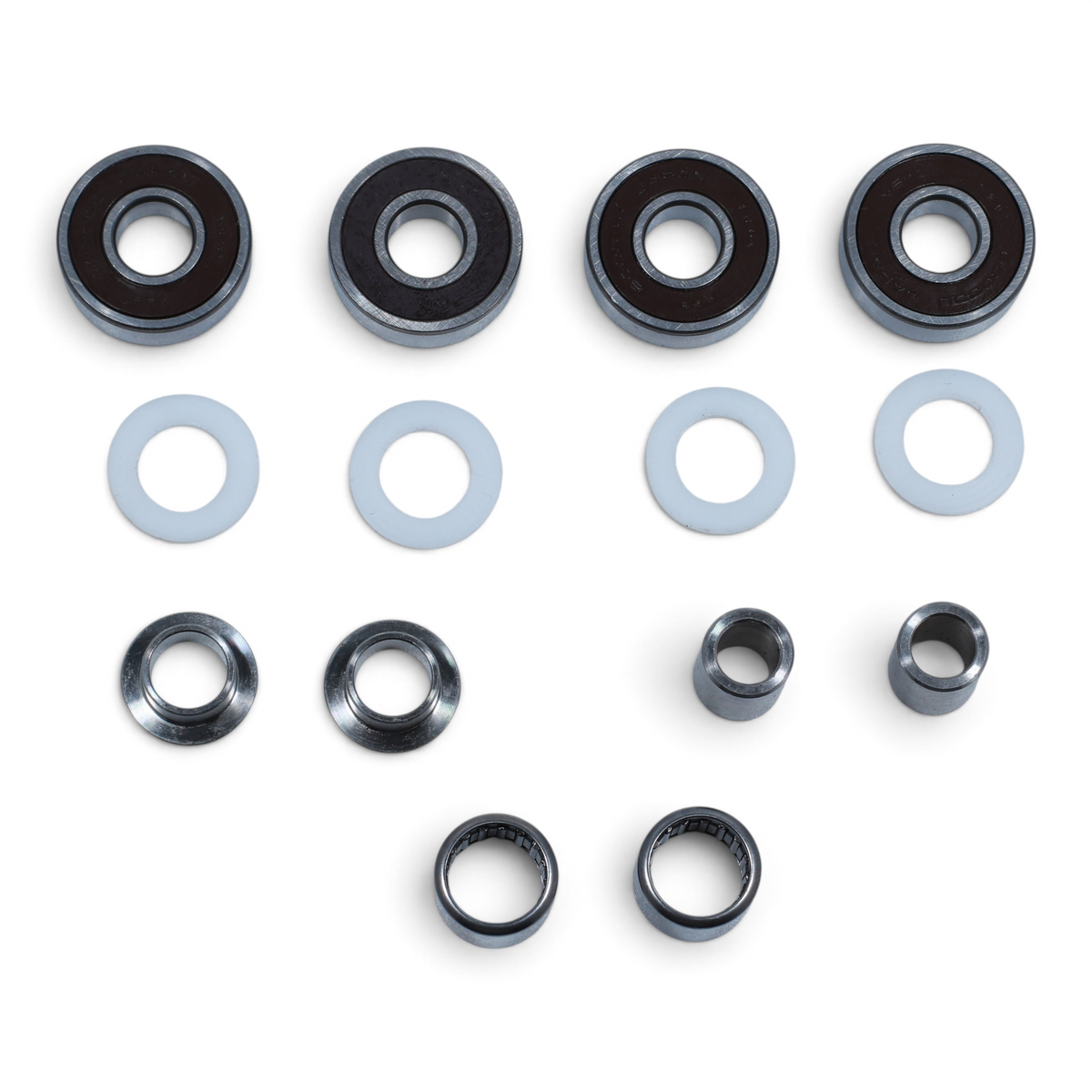 Escooterparts Surron Light Bee X frame and swingarm maintenance kit with metal bearings, spacers, and white washers.